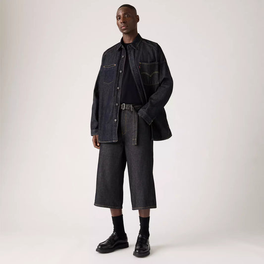 Pantaloncini Twisted baggy capri in denim blu scuro